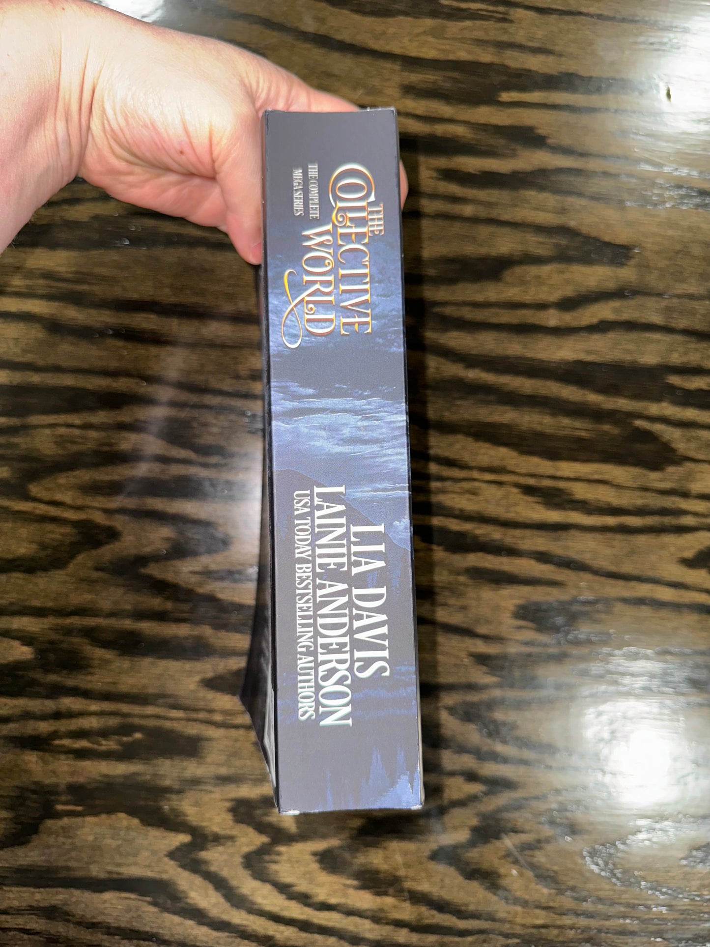 The Collective World signed paperback mega series signed with swag pack